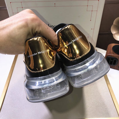 ALEXANDER MCQUEEN NERE CON RETRO ORO E SUOLA BIANCA IN GOMMA